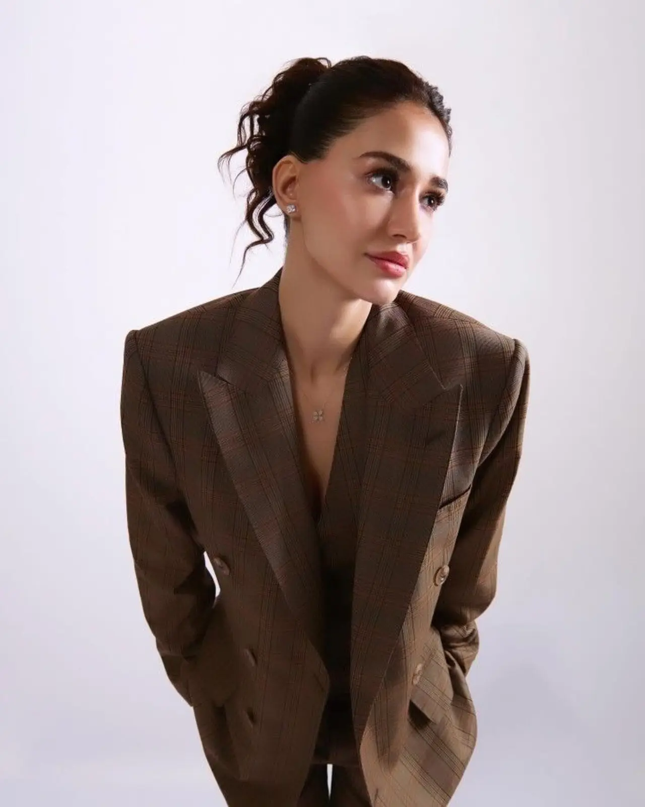Disha’s suiting moments lean into bold monochromes and sleek fits that feel ultra-polished. Whether she opts for structured tailoring or a softer silhouette, her looks are all about balance.
